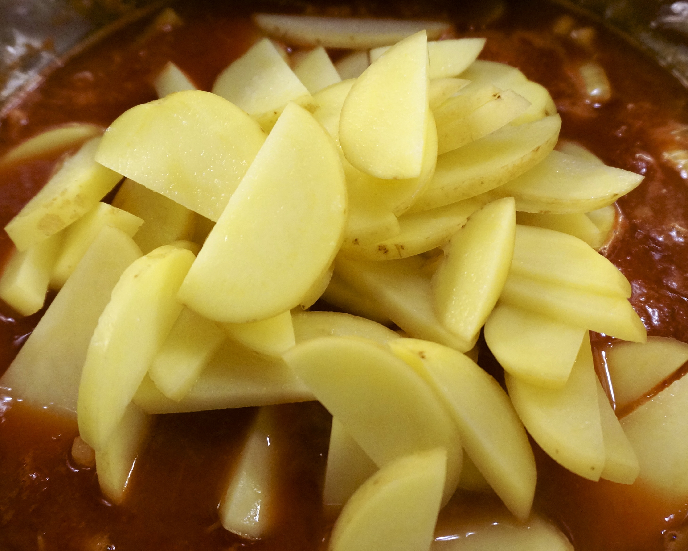 cod soup, potatoes, tomatoes, onions